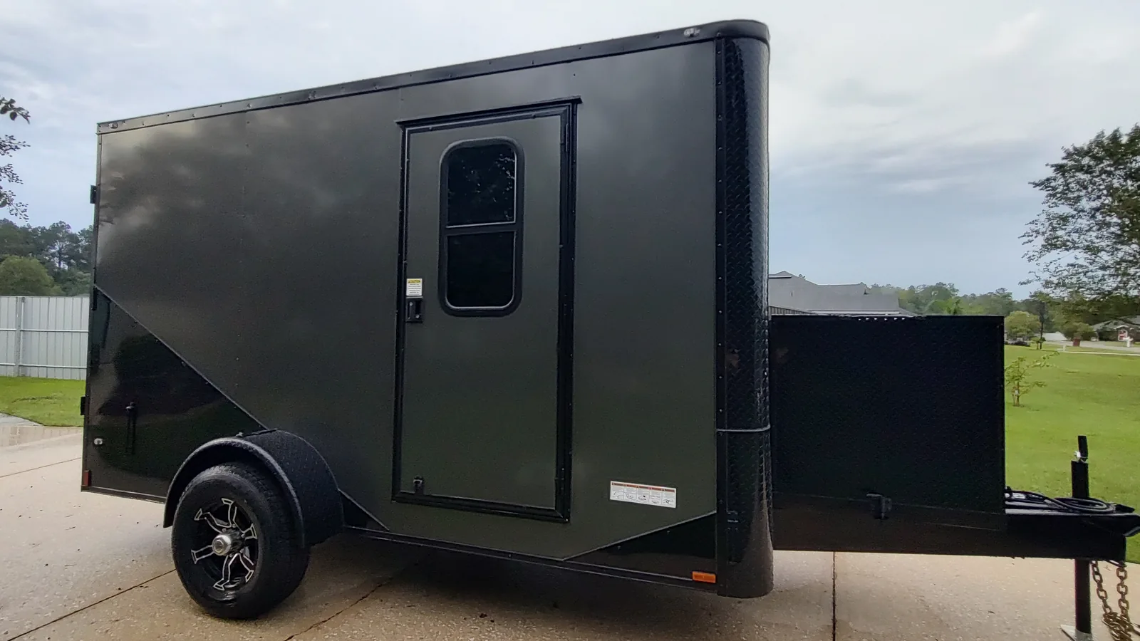 Charcoal gray 2026 6×12 mobile grooming trailer exterior